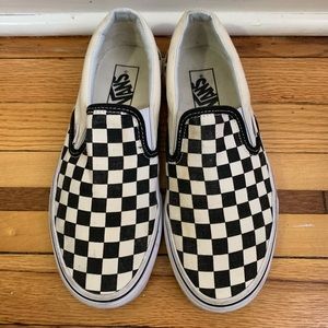 White and black van slip on sneakers